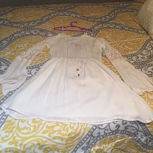 Small beige off the shoulder dress